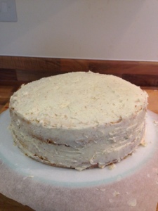 Apply a crumb coat to the cake using my vanilla buttercream recipe
